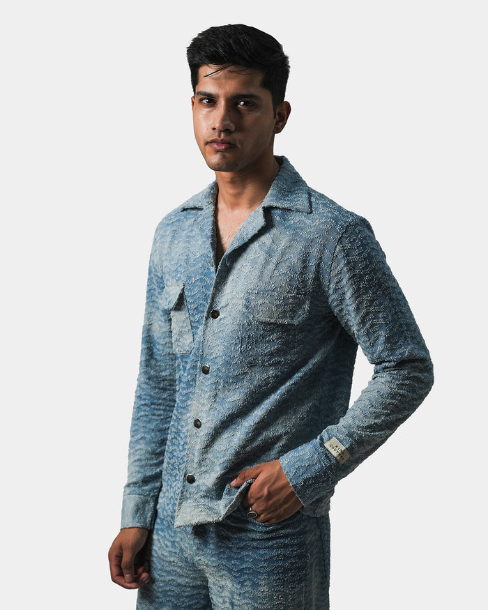 DISTRESSED DENIM JACKET