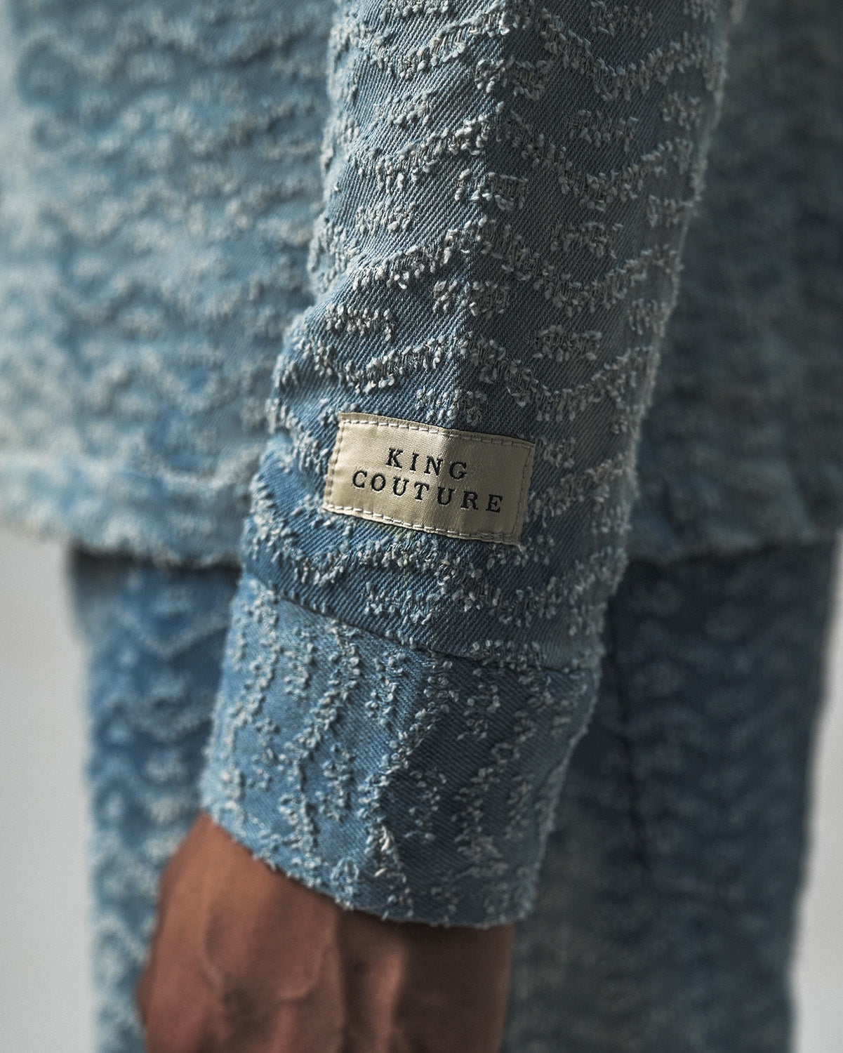 DISTRESSED DENIM JACKET