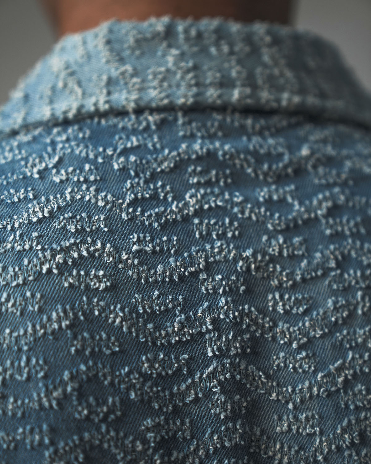 DISTRESSED DENIM JACKET