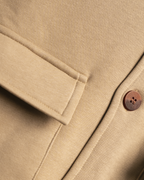 TAN SHACKET