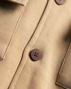 TAN SHACKET